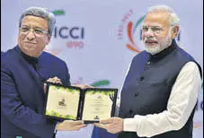  ?? PTI ?? Prime Minister Narendra Modi with FICCI president Pankaj Patel (left) in New Delhi on Wednesday