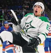  ?? Frank Franklin II/Associated Press ?? The Dallas Stars’ Jason Robertson celebrates after scoring a goal during the first period against the New York Islanders on Jan. 10 in Elmont, N.Y.