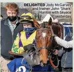  ??  ?? DELIGHTED Jody Mcgarvey and trainer John ‘Shark’ Hanlon with Skyace yesterday