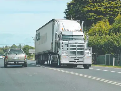  ?? ?? A truck travels along the Bass Highway in northern Tasmania.