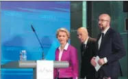  ?? DARKO BANDIC / AP ?? European Commission President Ursula von der Leyen, Slovenia’s Prime Minister Janez Jansa (center) and European Council President Charles Michel arrive to address a media conference at the Brdo Congress Center in Kranj, Slovenia, on Wednesday.