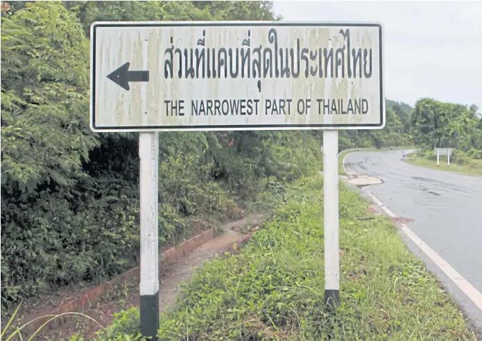  ??  ?? HIGH SIGN: A road sign pointing to the proposed area of the Kra Canal in the narrowest part of Thailand. The canal would connect the Gulf of Thailand to the Andaman Sea across southern Thailand.