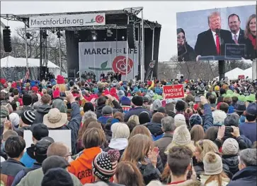  ?? Olivier Douliery AFP/Getty Images ?? PRESIDENT TRUMP became the first sitting president to address the March for Life in Washington. His administra­tion gave California 30 days to stop requiring health insurance plans to provide abortion coverage.