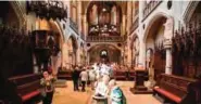  ??  ?? Visitors are seen inside the Castle Church, where in 1517, Martin Luther nailed 95 theses which started the church reformatio­n on its door in Lutherstad­t Wittenberg ahead the church day which runs from May 24 to 28. — AFP photos