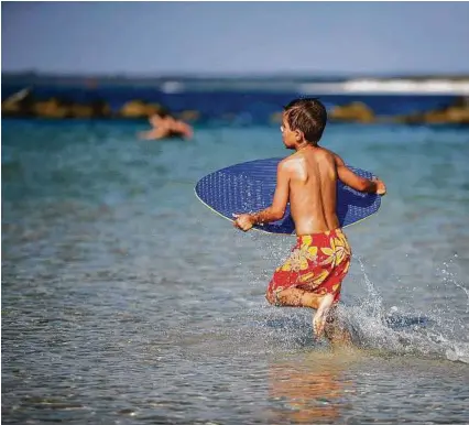  ?? Gary Bogdon ?? Panama City Beach, Fla., boasts 320 days of sunshine and miles of sugary white sand beaches.