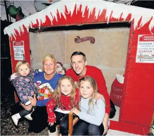  ??  ?? The wonderful Flemings The family are pictured at their Santa’s Grotto