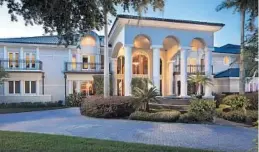  ?? UNEEK ?? Spanning three acres on Lake Butler, Shaquille O’Neal’s former compound holds a 31,000-squarefoot estate, a 6,000-square-foot basketball court and a 17-car showroom.
