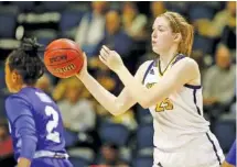  ?? STAFF FILE PHOTO BY C.B. SCHMELTER ?? Abbey Cornelius has been given more of a playmaking position for the UTC women’s basketball team this season, and the junior forward has responded with 42 assists — one more than she had in her first two seasons combined with the Mocs.