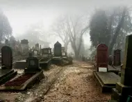  ??  ?? A haunted-looking churchyard at an early 14th-century basilica in Sighisoara