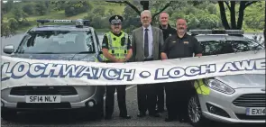  ??  ?? Launching water safety week were Inspector Mark Stephen, Michael Russell MSP, Derek Wilson, from the fire and rescue service, and Iain MacKinnon, co- ordinator of LochWatch Loch Awe.