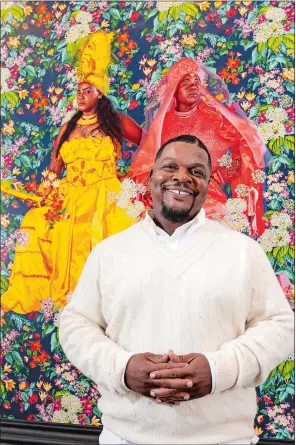  ?? CHARLES SYKES, INVISION/AP ?? Kehinde Wiley poses for a portrait at Sean Kelly Gallery in New York.