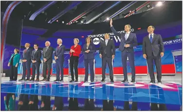  ?? AP/ERIC GAY ?? Democratic presidenti­al candidates (from left) Sen. Amy Klobuchar, D-Minn., Sen. Cory Booker, D-N.J., South Bend Mayor Pete Buttigieg, Sen. Bernie Sanders, I-Vt., former Vice President Joe Biden, Sen. Elizabeth Warren, D-Mass., Sen. Kamala Harris, D-Calif., entreprene­ur Andrew Yang, former Texas Rep. Beto O’Rourke and former Housing Secretary Julian Castro are introduced Thursday for the Democratic presidenti­al primary debate hosted by ABC on the campus of Texas Southern University in Houston.