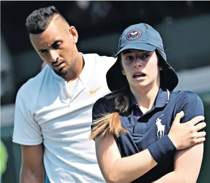  ??  ?? Helping hand: Nick Kyrgios consoles the injured ball girl (above), while Rafael Nadal (right) eased through his first-round match