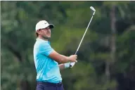  ?? Chris Carlson / Associated Press ?? Brooks Koepka watches his tee shot on the 16th hole during Friday’s second round of the Wyndham Championsh­ip in Greensboro, N.C.