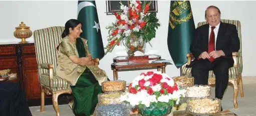  ??  ?? External Affairs Minister Sushma Swaraj with Prime Minister Nawaz Sharif of Pakistan in Islamabad in December 2015