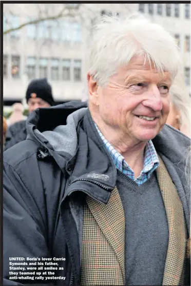 ?? Picture: JOHN STILLWELL/PA ?? UNITED: Boris’s lover Carrie Symonds and his father, Stanley, were all smiles as they teamed up at the anti-whaling rally yesterday
