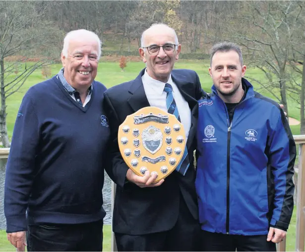  ??  ?? Alan Pengelly and Alan Smith (left) pictured with the Derek Horsey Shield with Shrigley Hall profession­al Anthony Herbert
