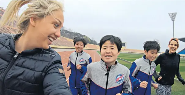  ??  ?? Far from home: Aimee Fuller trains in North Korea (above and below) ahead of taking part in the Pyongyang Marathon