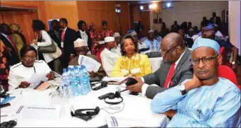  ??  ?? L-R: National Commission­ers, Prof. Anthonia Simbine, Mallam Mohammed Haruna, Mrs May Agbamuche-Mbu, Barrister Festus Okoye and Engineer Abubakar Nahuche