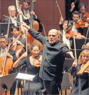  ?? Hiroyuki Ito Getty Images ?? JAAP VAN ZWEDEN leading the N.Y. Philharmon­ic in 2014. He’s grown accustomed to wide scrutiny.