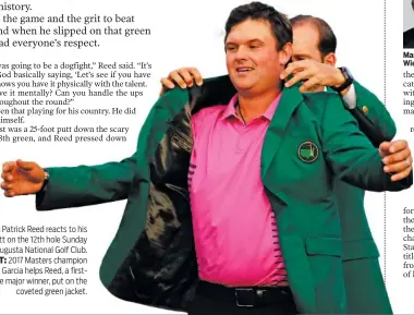  ??  ?? RIGHT: 2017 Masters champion Sergio Garcia helps Reed, a firsttime major winner, put on the coveted green jacket.