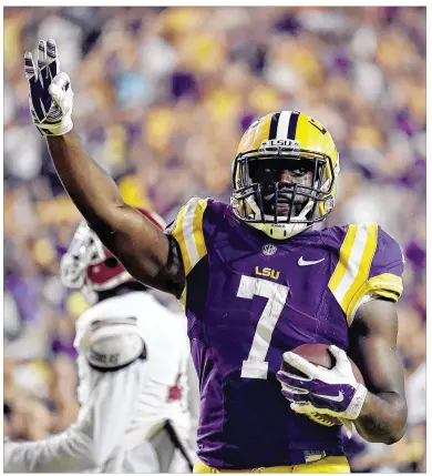  ?? STACY REVERE / GETTY IMAGES ?? LSU running back Leonard Fournette says he thinks football will help heal wounds in a tense Baton Rouge, where the fatal shooting of Alton Sterling and subsequent protests were followed by an ambush that left three police officers dead.