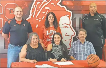  ??  ?? On hand to watch LFO senior guard Maia Payne sign on to play basketball for Earlham (Ind.) College were Gloria Payne and Chris Payne, along with LFO assistant coaches Matt Culbreth and Krista Davis and LFO head coach Dewayne Watkins. (Contribute­d photo)