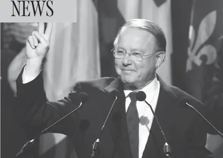  ?? PAUL CHIASSON / THE CANADIAN PRESS FILES ?? Bernard Landry salutes as he’s acclaimed leader of the Parti Québécois on March 2, 2001. Landry has died at age 81.