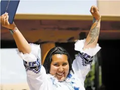  ??  ?? Jaelene Tapia celebrates after receiving her diploma at the Santa Fe Prep graduation ceremony.