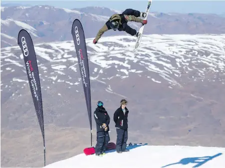  ??  ?? Comox Valley’s Darcy Sharpe flies through the air during the men’s slopestyle in Queenstown, New Zealand.