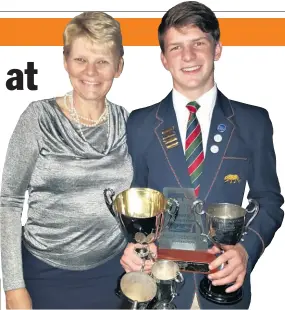  ??  ?? Retief Louw (Gr11) pictured with his mother Anré, won eight subject prizes and four trophies for excellence in academics Ntando Mthuli (Dux 2018) was awarded no fewer than a staggering fifteen trophies while Kayleen Loganathan won a total of seven subject awards and special trophies
