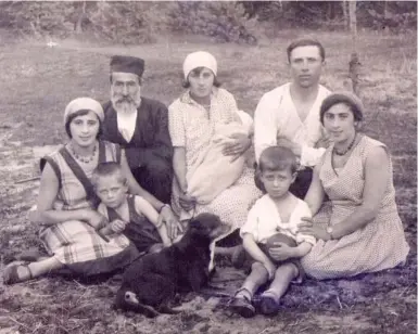  ??  ?? Bernie Farber’s father, Max, second from right, and his family in pre-war Poland, including, from left, Aunt Malka, half-brother Yitzchak, grandfathe­r Mordechai, an unidentifi­ed woman with child, half-brother Sholom and Max’s wife, Zisela. Max was the...