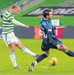  ??  ?? Leigh Griffiths fires home Celtic’s opening goal.