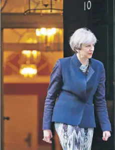  ?? FOTO: REUTERS ?? ►► Theresa May afuera del número 10 de Downing Street, en Londres, ayer.