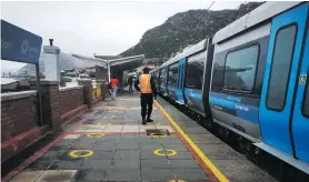  ?? Photo: Suné Payne ?? Commuters leave on one of the new blue trains, known as the ‘People’s Trains’, at Kalk Bay Station on Tuesday, 11 January.