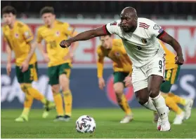  ??  ?? Romelu Lukaku scores Belgium’s third goal from the penalty spot.