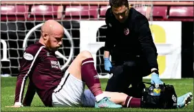  ?? ?? CONCERN: Boyce receives treatment after feeling tightness in his groin yesterday