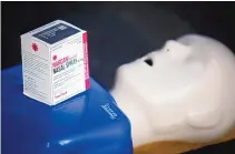  ?? RAY CHAVEZ/BAY AREA NEWS GROUP/TNS ?? A kit of Narcan nasal spray sits atop a dummy before a Narcan training session for elementary school teachers in Rodeo, Calif. Teachers learned how to use it in the event of a fentanyl overdose to revive students.