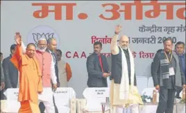  ??  ?? Uttar Pradesh chief minister Yogi Adityanath and Union home minister Amit Shah during a pro-caa rally in Lucknow on Tuesday.