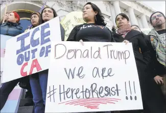  ?? ASSOCIATED PRESS FILE PHOTO ?? Protesters hold signs as they listen to speakers at a rally outside of City Hall in San Francisco in January. California lawmakers return Monday from a monthlong break with a busy agenda that includes tackling the state’s housing crisis.