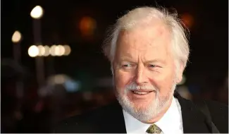  ?? ?? Ian Lavender poses for photograph­ers upon arrival at the World premiere of Dad's Army at a central London cinema, 26 January 2016.