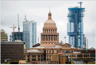  ?? JAY JANNER / AMERICAN-STATESMAN ?? The city of Austin is expecting $3 billion in new constructi­on value in 2019. The Legislatur­e returns in 2019 and is expected to revisit a bill that would cap the city’s property tax increases, which could produce budgeting concerns for the city.