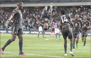  ?? ( Pic: Gallo Images) ?? Orlando Pirates’s Monnapule Saleng celebrates his goal with teammates during their game against Maritzburg United yesterday.