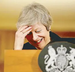  ?? AFP ?? British Prime Minister Theresa May reacts during a press conference on Thursday as she battles against a rebellion over her draft Brexit deal and members of her own party plot to oust her.