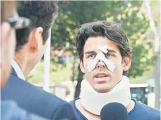  ??  ?? HEADBUTTED: Tennis player Thomas Drouet of Monaco, training partner of Australian tennis player Bernard Tomic, leaves a court house bandaged and wearing a neck brace in Madrid. — AFP photo