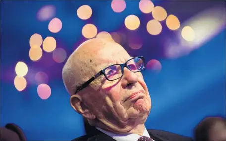  ?? Pool Getty Images ?? SOME analysts believe the Murdochs will focus their business more around news, sports and possibly streaming, and use asset sale proceeds to take private a slimmed down news and sports broadcasti­ng firm. Above, 21st Century Fox Executive Chairman...