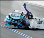  ?? ASSOCIATED PRESS ?? BUBBA WALLACE crashes in Turn 12 during practice for Sunday’s NASCAR Cup Series auto race at Charlotte Motor Speedway in Concord, N.C., Saturday.