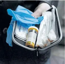  ?? JONATHAN HAYWARD/THE CANADIAN PRESS ?? A naloxone anti-overdose kit is shown. Student leaders running the University of Ottawa’s orientatio­n week events won’t be allowed to administer the opioid antidote naloxone in the event of an overdose due to liability concerns if the injection were to...