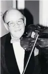  ??  ?? Ed Hollyer was also an accomplish­ed violinist.