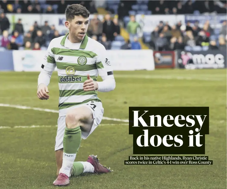  ??  ?? 0 Ryan Christie does a knee-slide celebratio­n after putting Celtic 2-1 in front in Dingwall yesterday. The victory represente­d the champions’ tenth win in a row in all competitio­ns.